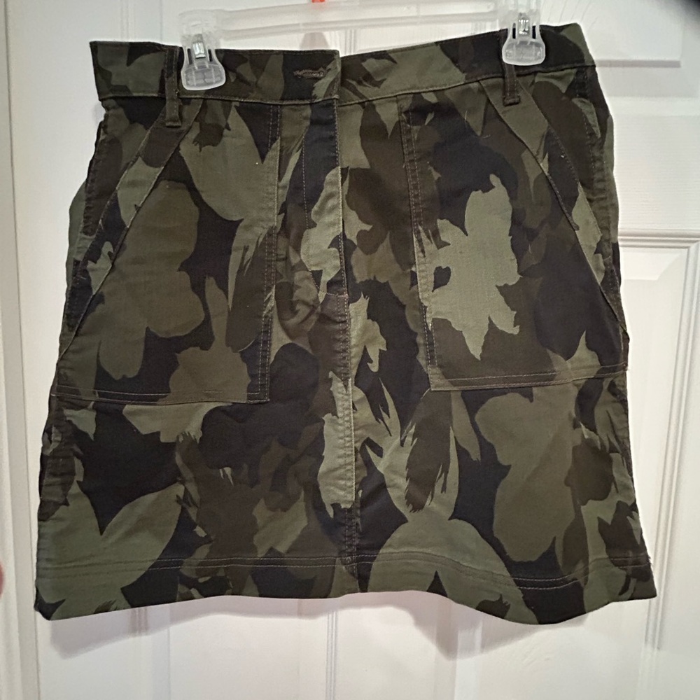 3 For $30 NWOT Camouflage Skirt with front and back pockets &zipper front.